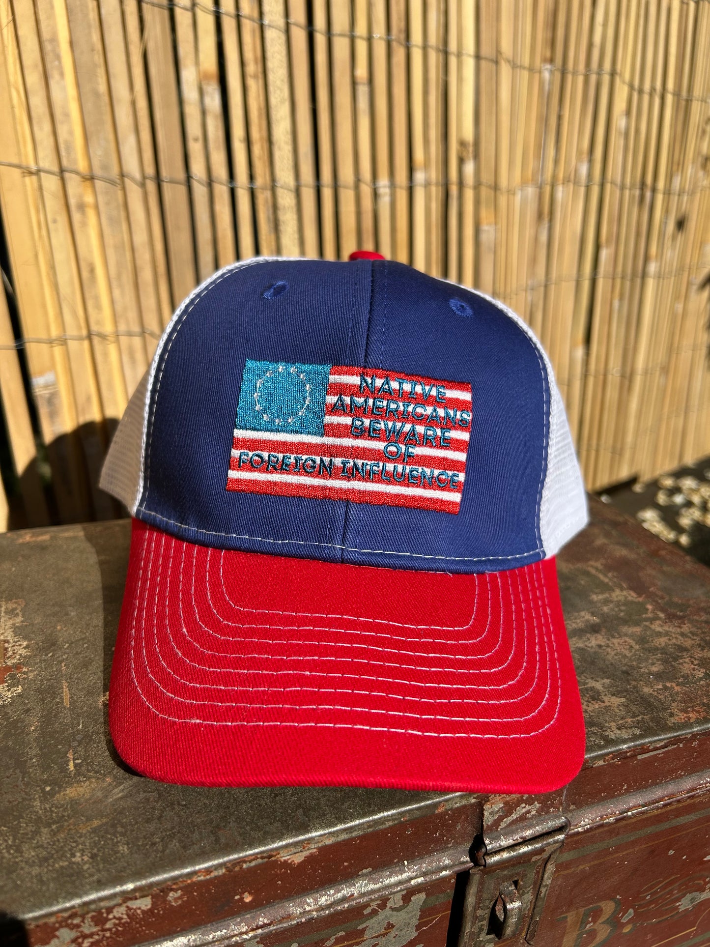 "Beware of Foreign Influence" Red, White, and Blue Trucker Cap