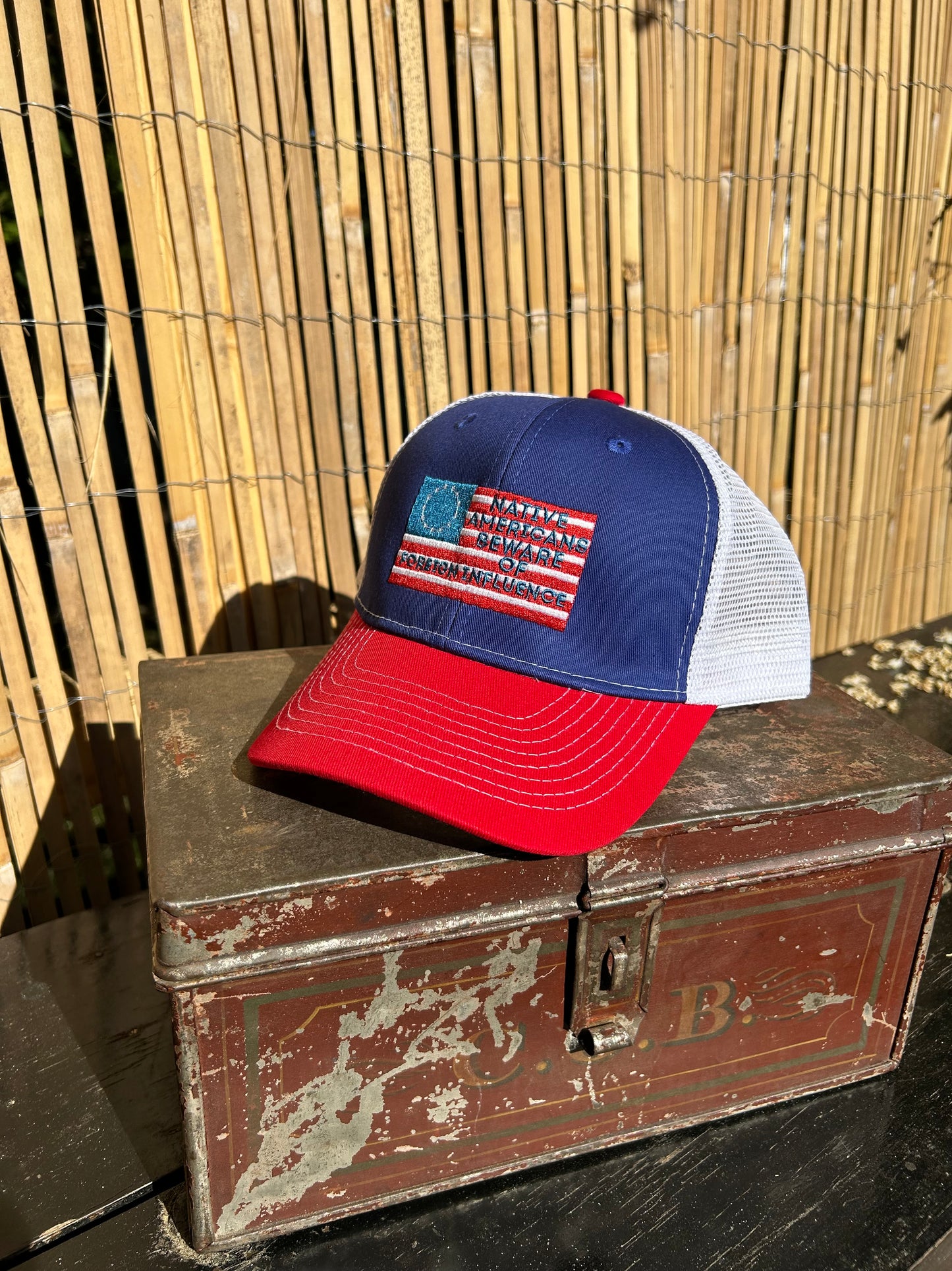"Beware of Foreign Influence" Red, White, and Blue Trucker Cap